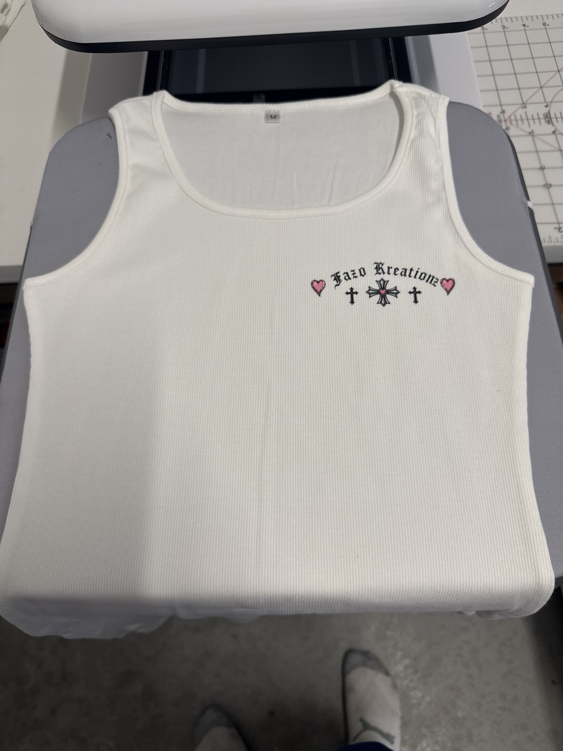 White Fazo Kreationz tank top with a small custom chest print